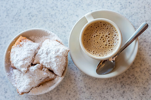 Beignets: powdered sugar covered fried dough greatness